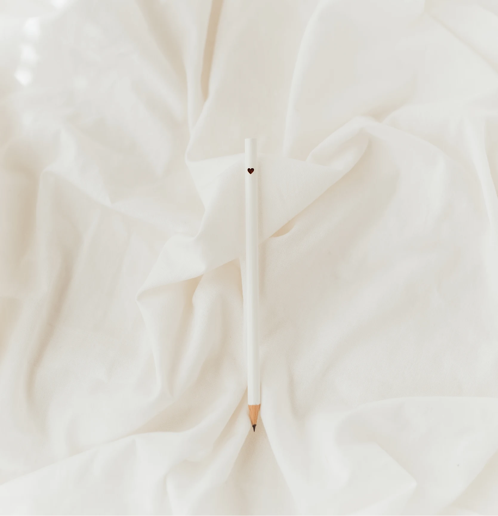 Bleistift mit Herz